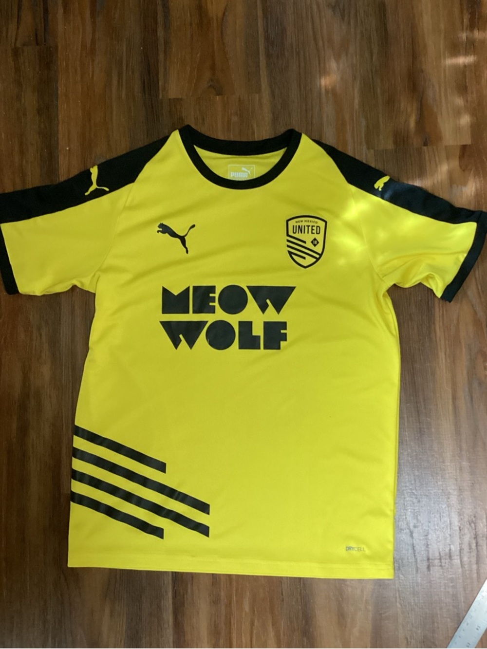 Puma Yellow and Black Meow Wolf United Soccer Jersey